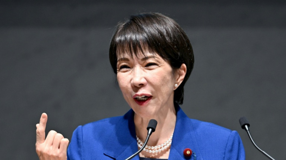 Japan govt approves record 122 trillion yen budget
