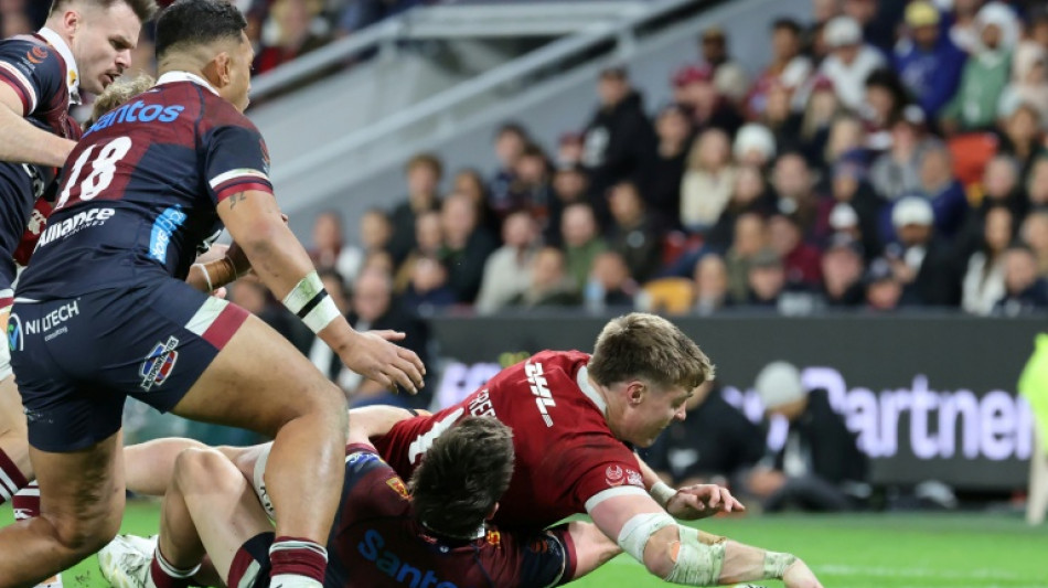 Freeman at the double as slick Lions romp past Reds 52-12
