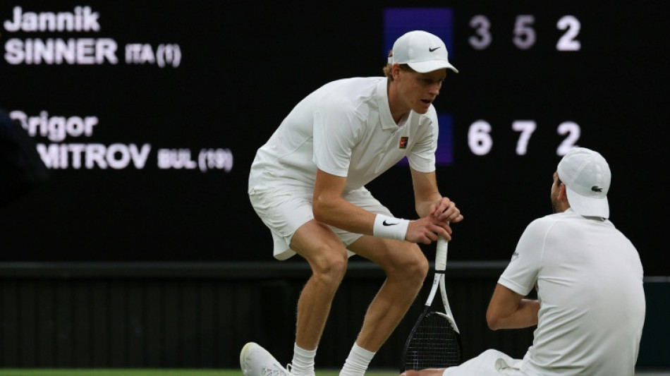 Sinner into Wimbledon quarters after injured Dimitrov retires