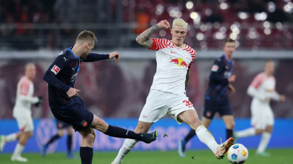 Leipzig vence Heidenheim (2-1) e coloca press&atilde;o sobre Dortmund e Stuttgart