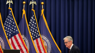 Asia markets waver after Wall St retreats from record 