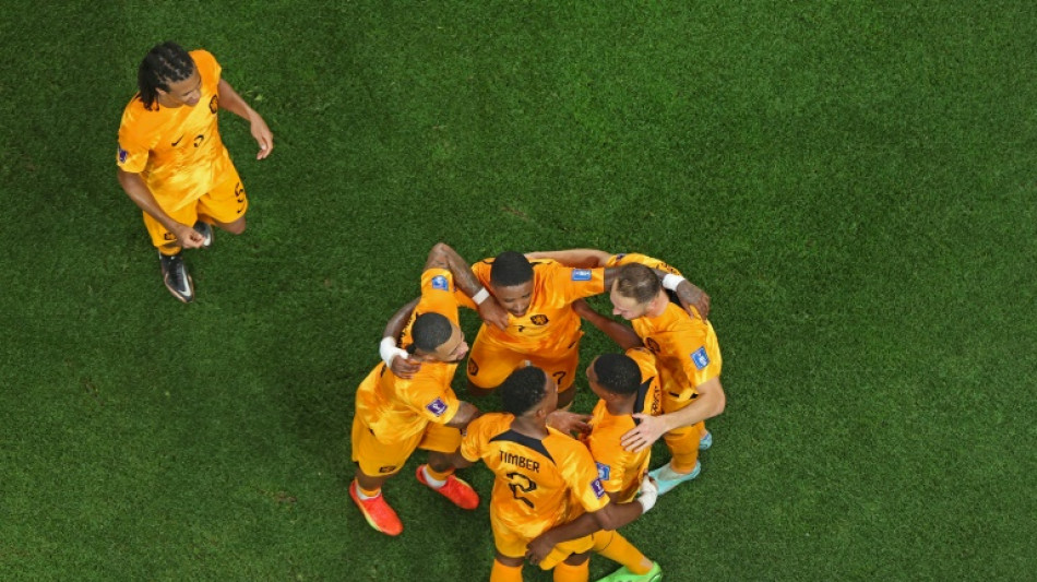 Dutch sweep into World Cup quarters as Messi takes centre-stage