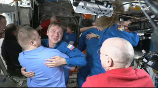 Astronautas chegam &agrave; Terra ap&oacute;s nove meses retidos na ISS