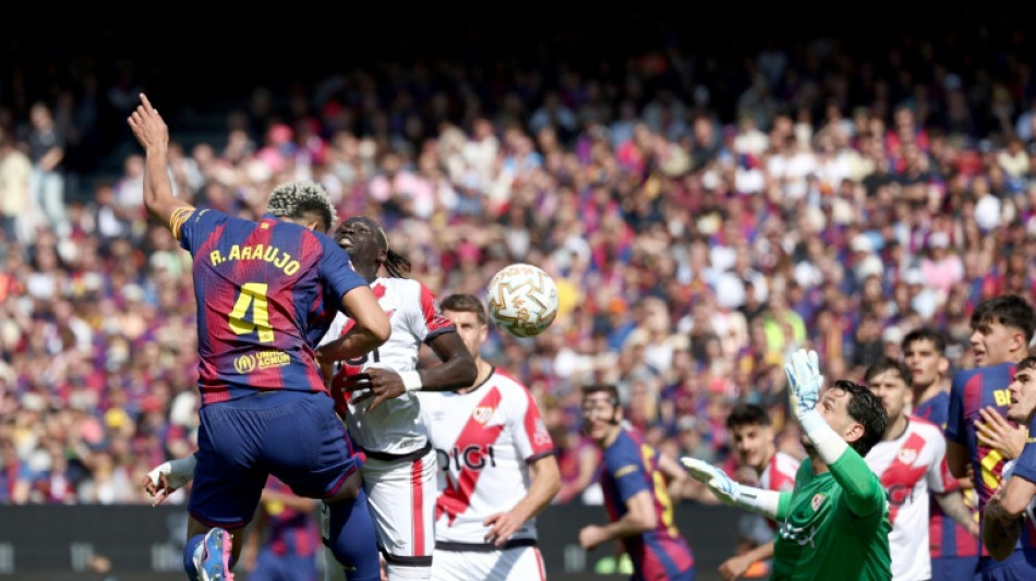 Araujo header scrapes Liga leaders Barcelona win over Rayo