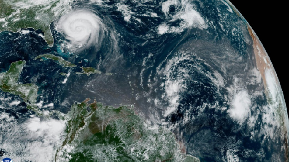 North Carolina coasts prepare for flooding as Erin churns offshore