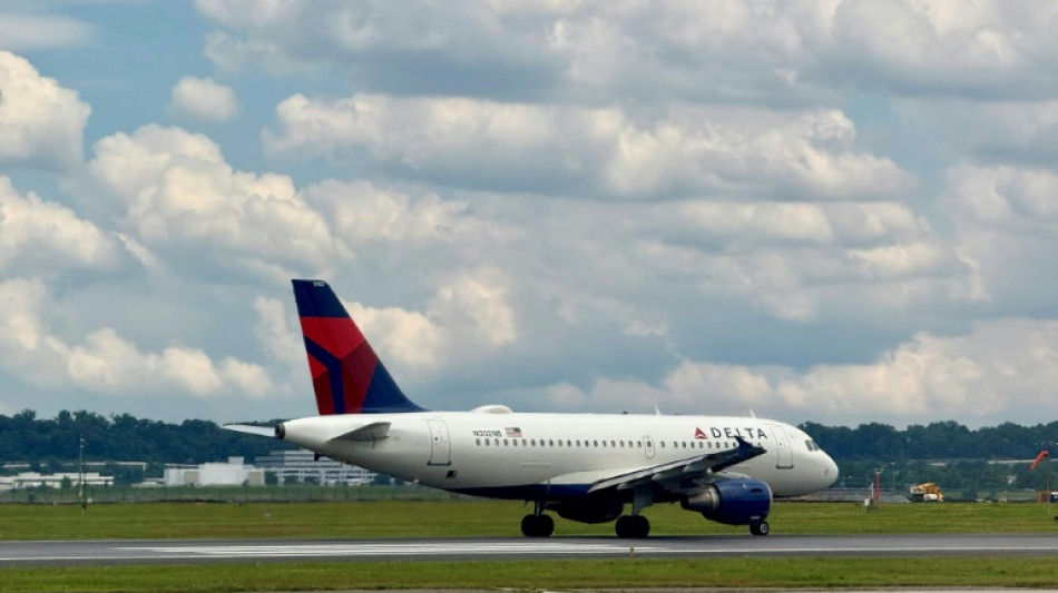 Delta offers upbeat outlook on travel demand, lifting shares