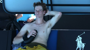 Struggling Sinner drops set before making Melbourne last 16