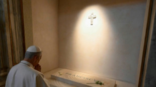 Leo XIV, new pope and 'humble servant of God', visits Francis's tomb