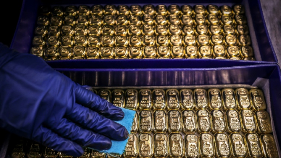 Asian stocks rise on electronics tariffs exemption, gold hits new high