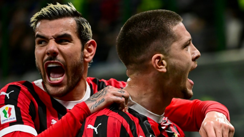 Jovic shoots AC Milan into Italian Cup final with derby double