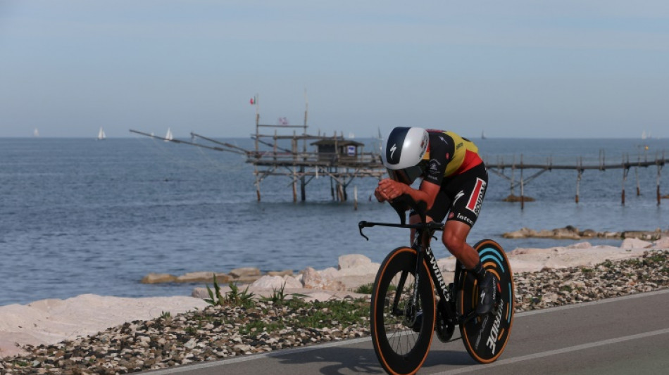 Evenepoel wins Giro d'Italia opening time trial as Roglic suffers