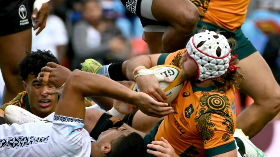 Last-gasp try saves Australia against Fiji  
