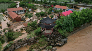Landslide kills four as rains lash northern China