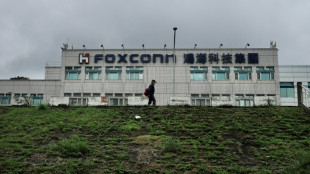Taiwan defends Foxconn over China tax probe