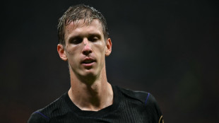 Barca's Olmo injured for a month, misses Clasico