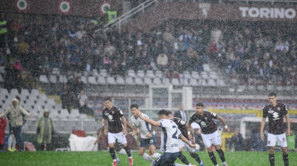 Inter beat Torino and downpour to move level with Napoli