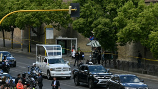 Hundreds of thousands at funeral mourn pope 'with an open heart'