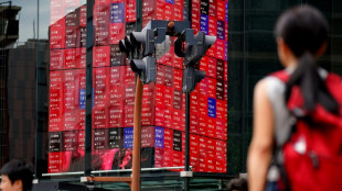 Asian markets waver as Japan exports show tariff strain