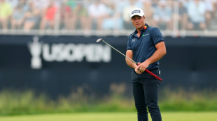 Hovland charges within one of leader Spaun at US Open