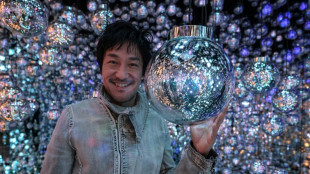 Cascading light and 'wobbling' orbs at new Tokyo art museum