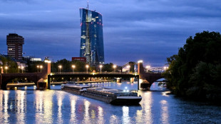 Stocks fall as fresh oil surge fans inflation fears
