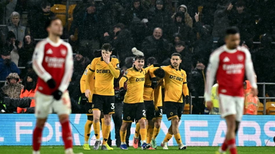 Arsenal blow two-goal lead in damaging Wolves draw