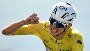 Pogacar extends Tour de France lead with dominant time-trial win