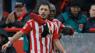 Ten-man Union go third despite Bochum stalemate