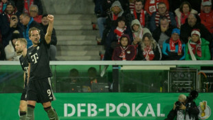 Kane scores twice as Bayern set European wins record