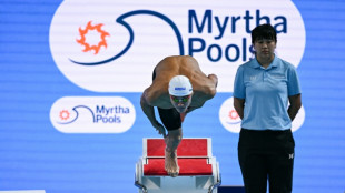 Popovici says came close to going home before winning world gold