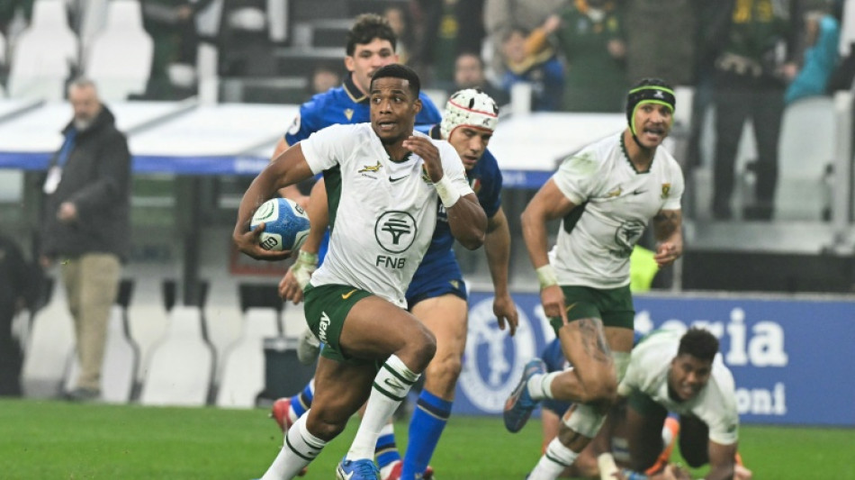 South Africa defy early red card to beat battling Italy