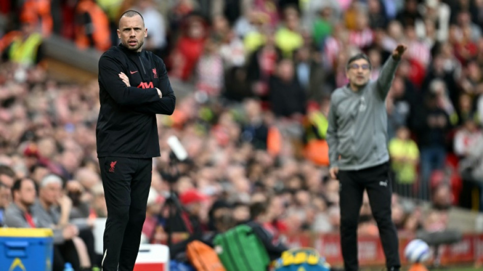 Heitinga returns to Ajax to take over as coach
