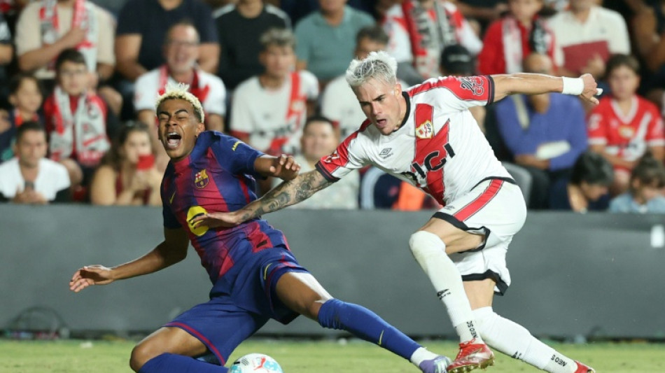 Barca hold on for draw against impressive Rayo