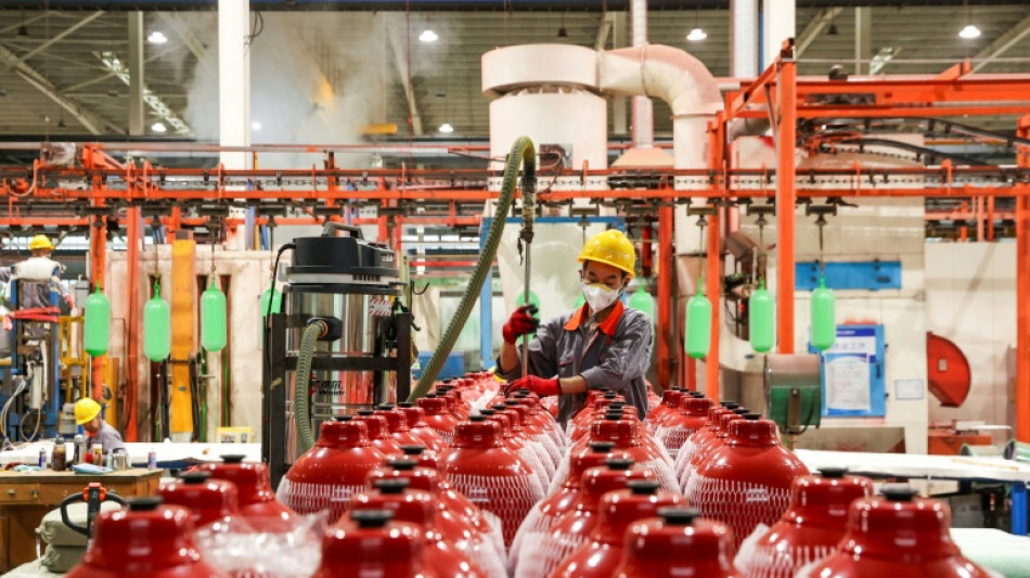 China factory output slumps but consumption offers bright spot