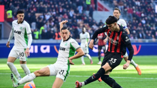 Napoli stumble at Udinese to leave AC Milan top in Serie A
