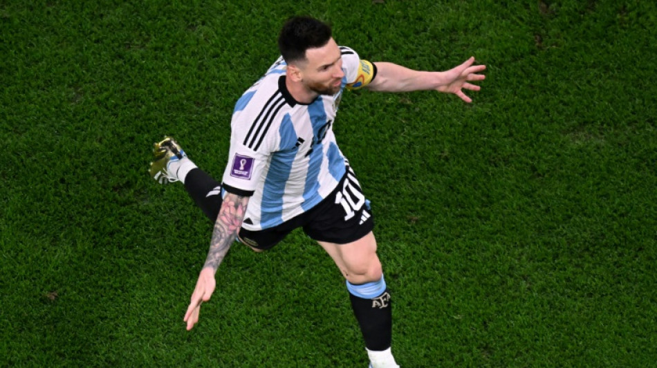 Messi magic helps send Argentina into World Cup last eight