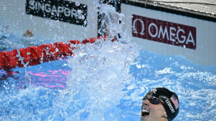 Ledecky beats McIntosh to win 800m freestyle thriller
