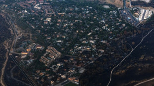 Spain PM vows 'climate pact' on visit to fire-hit region