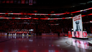 Panthers raise banner as NHL three-peat bid opens with win