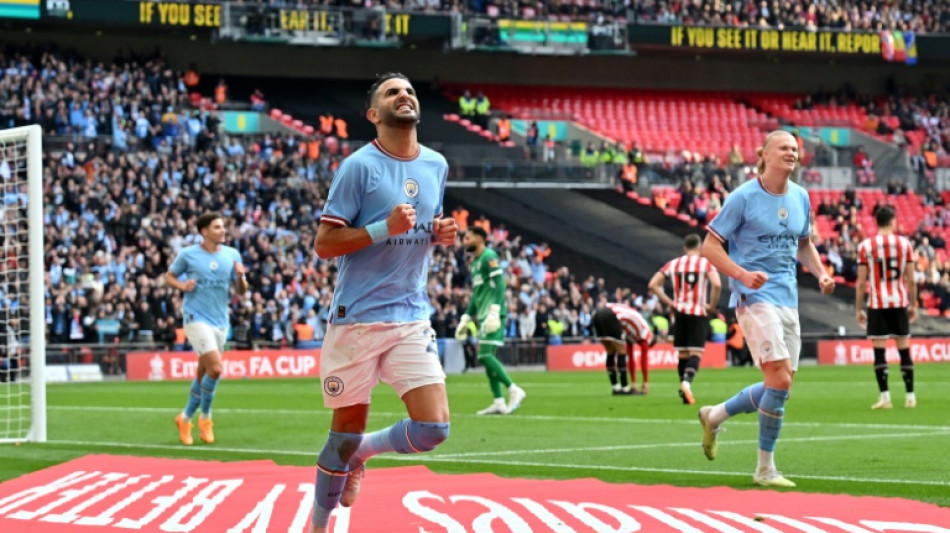 Mahrez treble fires Man City into FA Cup final 
