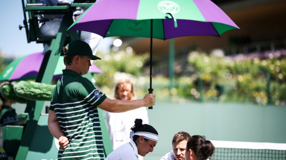 Tearful Jabeur forced to retire from Wimbledon first-round clash