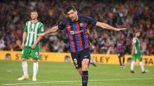 Barca thrash Betis to stay ahead of rampant Madrid