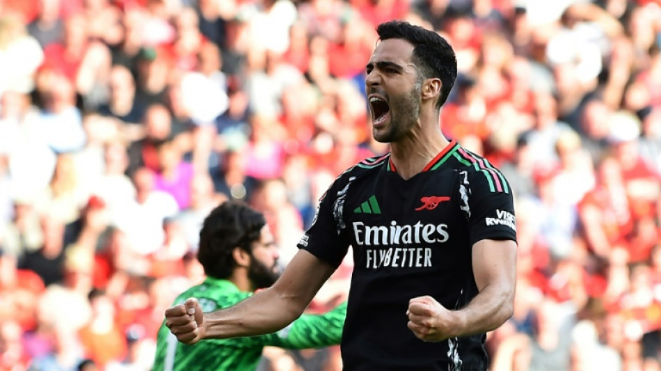 Arsenal hit back to rescue valuable draw at Liverpool