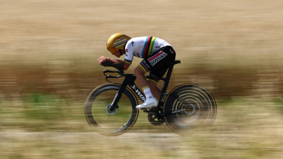 Evenepoel dominates Dauphine time-trial to slip into yellow