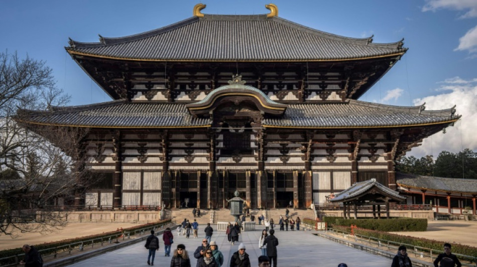 Asian markets mostly up with politics bump for Tokyo