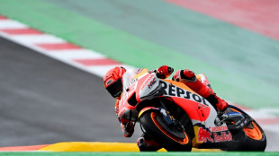 Marc M&aacute;rquez sufre una ca&iacute;da en los terceros libres de Portugal, dominados por Oliveira